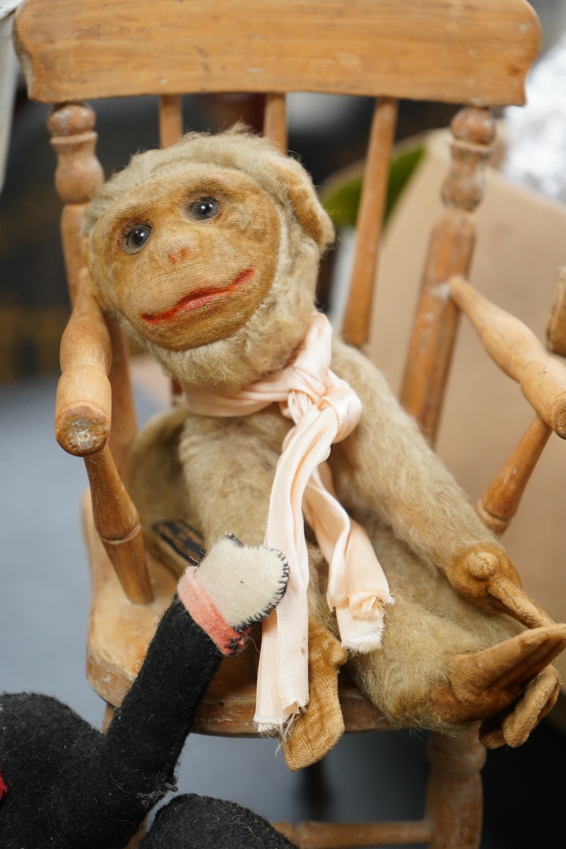 Two Nora Welling monkey soft toys, largest 38cm long and another felt made monkey together with a miniature Windsor chair and Disney Micky Mouse metal waste bin